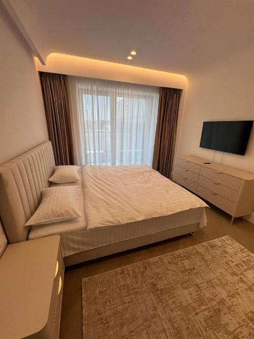 Modern 3-room apartment in Cortina 126 / Underground parking 7