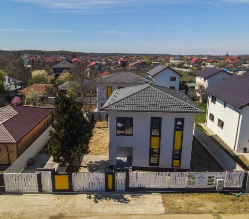 Vilă modernă cu 4 camere + birou + pod – Tunari 2