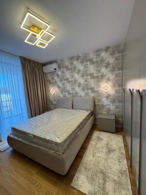 Apartament nou cu 2 camere, terasă generoasă și parcare subterană–Ivy Residence 5